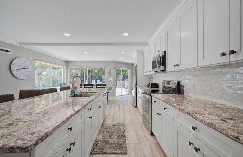Bay Isle House | Tropical Siesta Key Home with Incredible Pool, Hot Tub, and Patio!