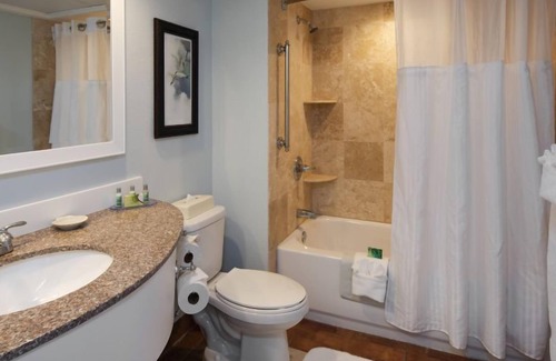 St. Pete Beach Hotel | Tropical View Villa 2BR With Balcony 4 Queen Beds at Island Grand at TradeWinds