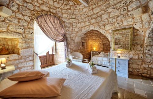 San Michele Salentino Villa | Trullo Santo Stefano by PosarelliVillas