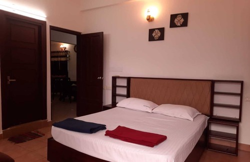 University of Kerala Senate House Campus Apartment | TRV Stays- OPP Mascot Hotel -9 Beds 6 Bath