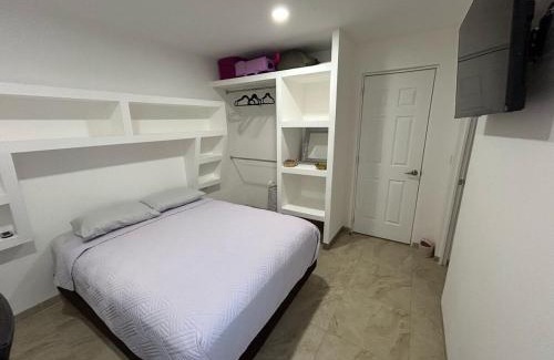 Jimenez Apartment | Tulipanes Pool AC WiFi