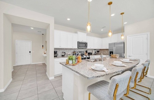 Tuscan Hills Villa | Ultimate 5 Bedroom Windsor Island Resort Pool home