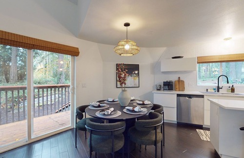 Burley House | Unique waterfront home with sauna, hot tub, and washer & dryer