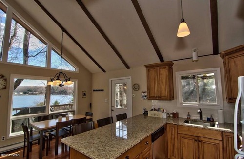 Hamlin House | Unwind at this immaculate lakefront home in a 4 star community!