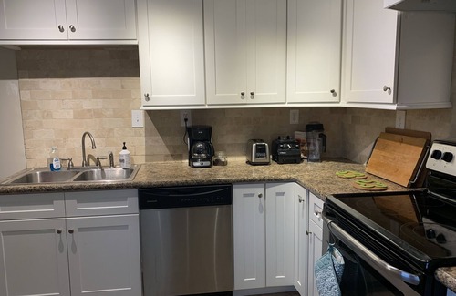 Historic Uptown Apartment | Updated apartment with yard close to waterfront