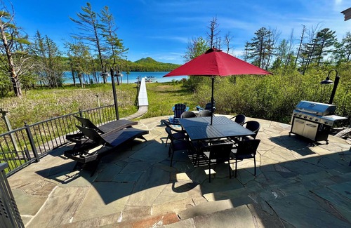 Cedar House | Updated! Elizabeth House is a Charming Craftsman on Little Traverse Lake.