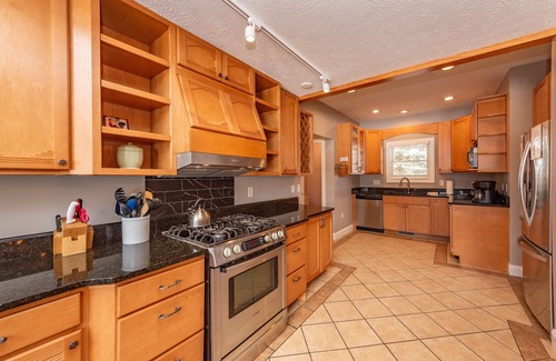 Waterfront Greens House | Updated Lakefront Retreat w/Pool Table & Hot Tub