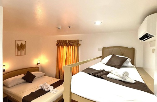 Puerto Princesa City Centre Hotel | Upgrace Inn