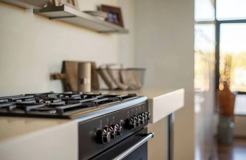 Brown and Stetson Business Condo | Urban chic loft, twinkling lights & mountain views