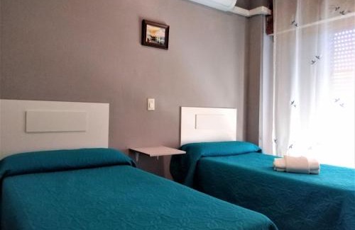 Cullera House | Vacansis Habitaciones de Hostal a Primera linea de playa en Cullera