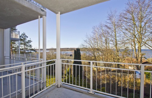 Lietzow Apartment | Vacation apartment with balcony, fireplace and sauna - Ferienresidenz Zwei Bodden FeWo 2-9