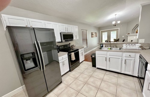 Golden Glades - The Woods House | Vacation Beach House with the heated private pool.