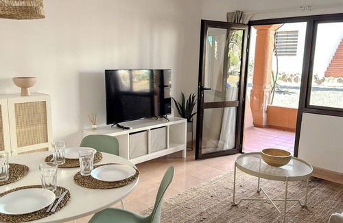 Corralejo Apartment | Vacation 'Oasis Dunas - Casa Ventura' with Shared Pool, Private Terrace and Wi-Fi