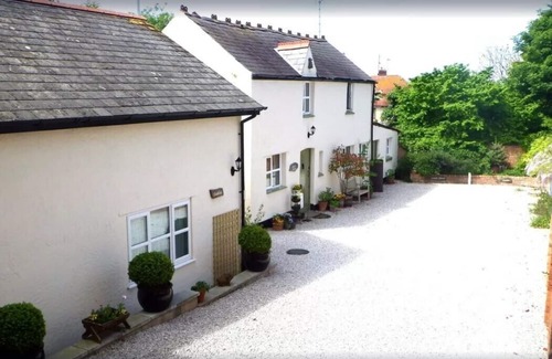 Prestatyn Cottage | Vale View Cottages-The Coach House. Log Burner, Garden, Near beach & town, Pets