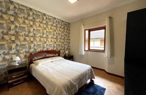 Vila Everest House | Vernon Village Tania · VV25 Aconchego noCapivari com lareira e ótimo wifi