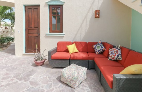 Nopolo House | Vibrant house with golf/ocean views, shared pool, partial AC, WiFi & gas grill!