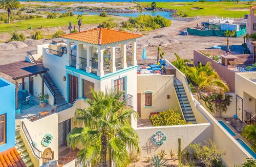 Nopolo House | Vibrant house with golf/ocean views, shared pool, partial AC, WiFi & gas grill!