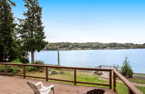 Agate House | Vibrant waterfront home with large deck, woodstove & striking sunset views