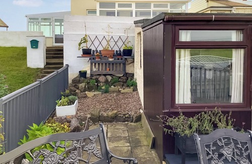 Anderby Creek Cottage | Views inland across the fields and only 100 yards to the unspoilt sandy beach at Anderby Creek.