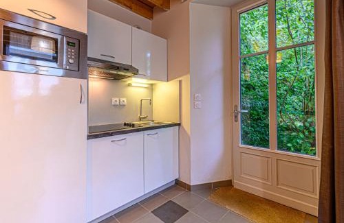 Baden Villa | Villa Château De Kergonano- dans l'Orangerie-4 by Interhome