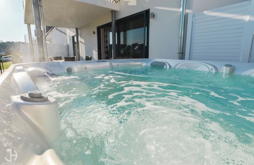 Muritz House | Villa Fleesenstrand am See | with outdoor whirlpool | Sky TV | Fireplace | sauna