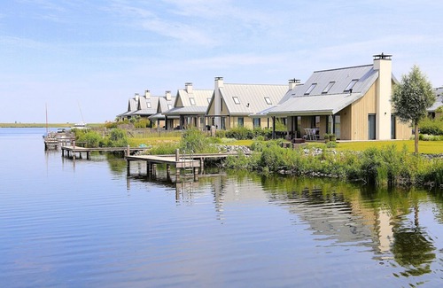 Tholen House | Villa in Bergen op Zoom with Waterfront Views