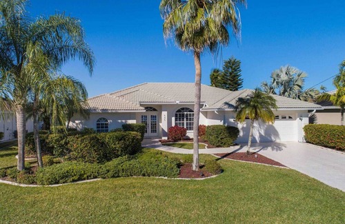 Eight Lakes Villa | Villa Melima - Stylishly Furnished Lakefront Home with Gulf Access, Amazing Pool Area