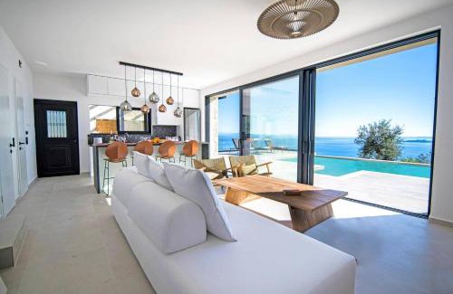 Petaleia Villa | Villa Nissaki View 3 by Villa Plus