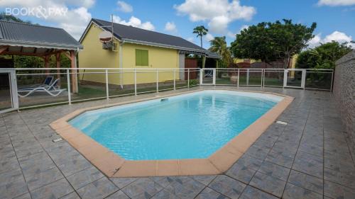 Saint-Francois House | Villa Vanille - Maison avec piscine partagée