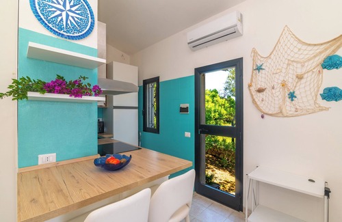 San Teodoro Villa | Villa 'Vista Mare Cala Ginepro' with Sea View, Private Terrace and Air Conditioning