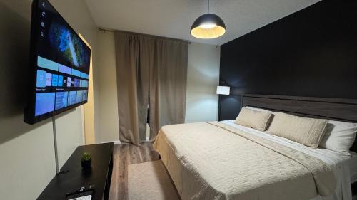 Arouca Apartment | Vive Luxe Condo w Pool & 247 Security near Airport