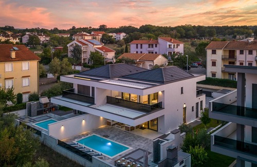 Porat House | Wake up in the morning to magnificent sea views in this luxury vacation home.