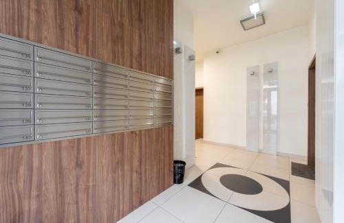 Wola Duchacka Apartment | Walerego Sławka Harmony Apartment by BookingHost