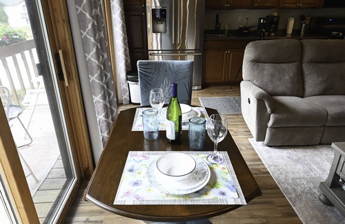 Mancelona Condo | Walk to golf course and pool. fireplace. Sleeps 2 adults. Boat Parking