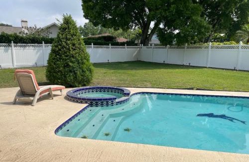 Collins Estates House | Walk to Indian Rocks Beach Exclusive Use of Hot Tub, Pool, BBQ,with Privacy