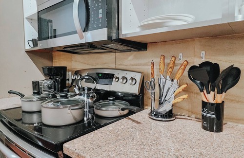 Midtown Village Apartment | Walnut Mega Kingdom/King Bed/85" TV/Arcades