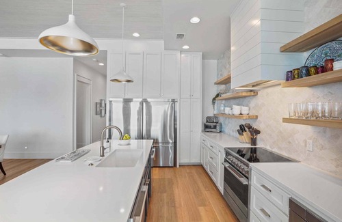 St. George Island House | Wander St. George Island sleeps 20, w/Pools/Workstations & Hot tub, 7 Bedrooms