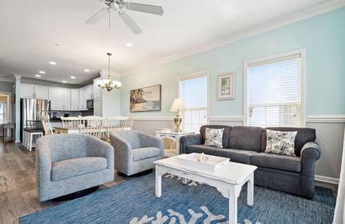 Waters Edge House | Water's Edge 114 - River Daze - Premier Riverfront Townhome - Pool & Fishing Pier!