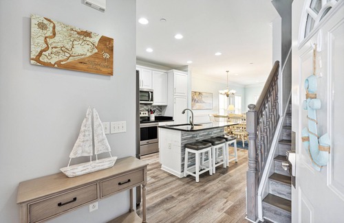 Waters Edge House | Water's Edge 114 - River Daze - Premier Riverfront Townhome - Pool & Fishing Pier!