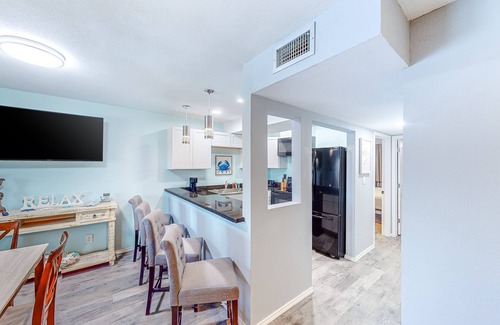 Port Isabel Condo | Water-view downtown condo with outdoor pool, balcony, W/D, AC - 30 day min stay