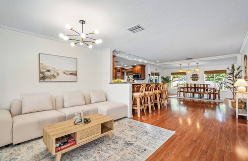 Lake Clarke Shores House | Waterfront Escape with Heated Pool, Mini-Golf, TikiHut in West Palm Beach