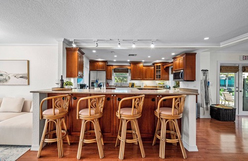 Lake Clarke Shores House | Waterfront Escape with Heated Pool, Mini-Golf, TikiHut in West Palm Beach