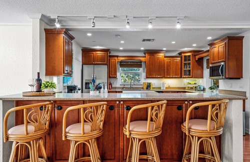 Lake Clarke Shores House | Waterfront Escape with Heated Pool, Mini-Golf, TikiHut in West Palm Beach