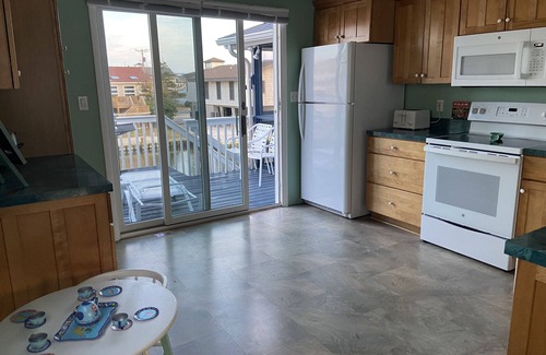 Fenwick Island House | Waterfront Fenwick Beach House with Dock, 3 Decks, Linens, Bikes, Kayaks, SUPs