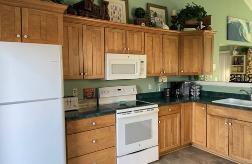 Fenwick Island House | Waterfront Fenwick Beach House with Dock, 3 Decks, Linens, Bikes, Kayaks, SUPs