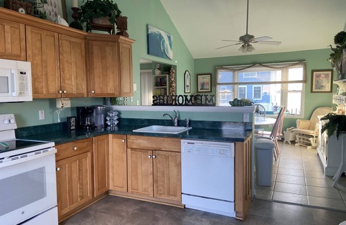 Fenwick Island House | Waterfront Fenwick Beach House with Dock, 3 Decks, Linens, Bikes, Kayaks, SUPs