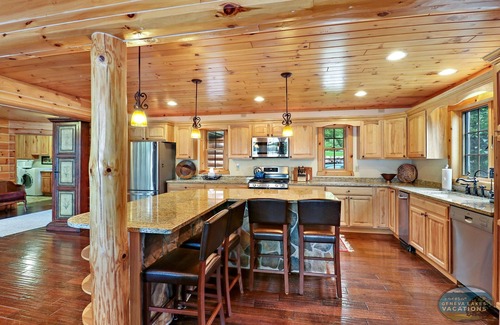 Whitewater House | Waterfront, Hand-Crafted Log Cabin |Sandy Beach |Dock |5200 Sq Ft |3.5 Acres |Stone Fireplace |Views