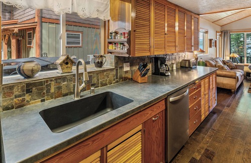 Sandpoint House | Waterfront home in Sagle with a dock, hot tub, and large lawn for families