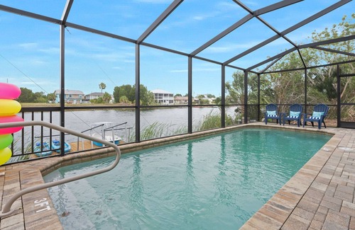 Spring Hill House | Waterfront Home - GameRoom/Saltwater Pool/Tropical Sunsets/Fish/Swim