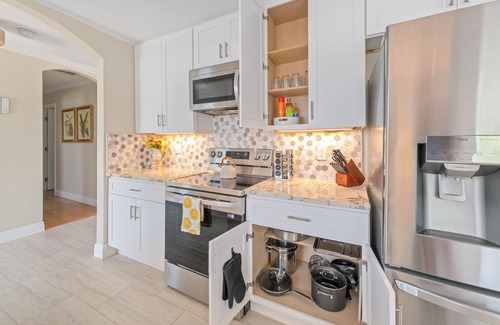 Convair Cove House | Waterfront Home with Heated Pool & Spa | Dock | 4.5 Blocks to Beach & Downtown